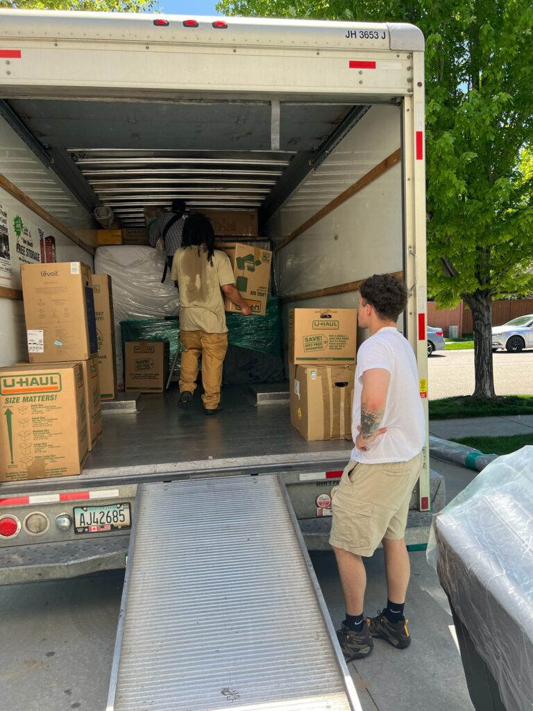 guys loading the Uhaul truck