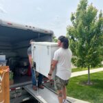 carrying a freezer onto a Uhaul for a local move