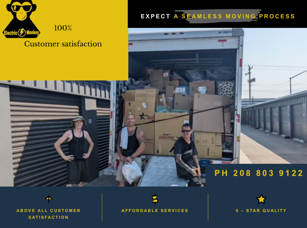 promo image includes 3 of our movers sitting on a uhual truck after a boise move