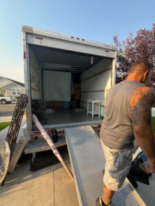 guys unloading a Uhaul