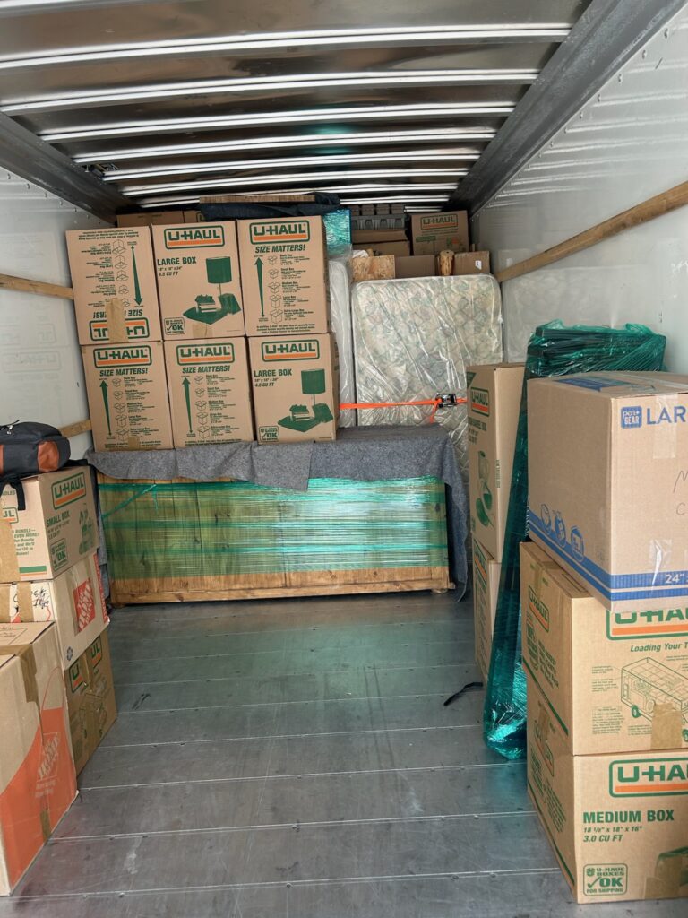 uhaul truck being packed for a move